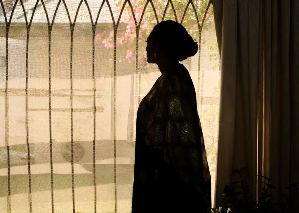 silhouette of a woman standing