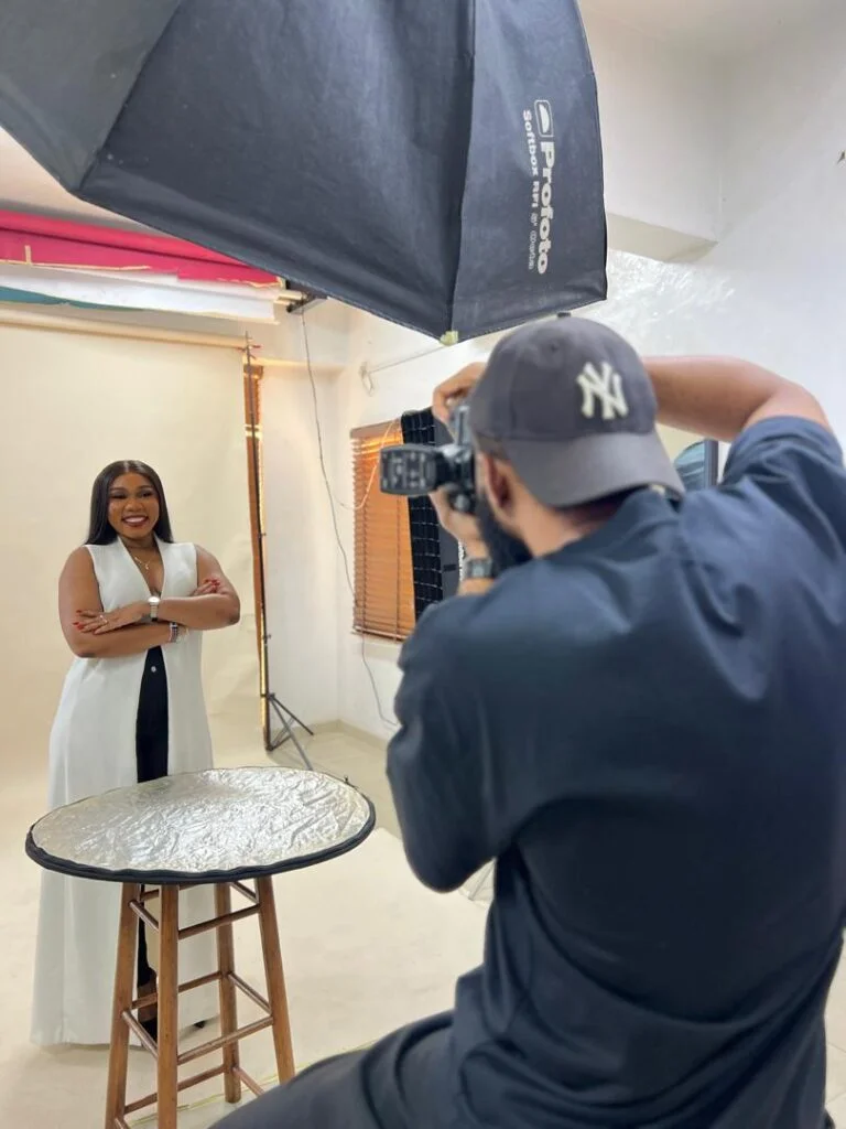 sainabou mbye taking a picture